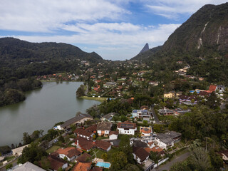 Aerial view of Granja Comary, Carlos Guinle neighborhood in the city of Teres&oacute;polis. Mountain region of Rio de Janeiro, Brazil. Drone photo. Houses, lake and hills and mountains