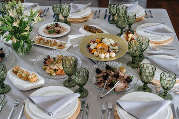 Catering Food Wedding Event Table, beautifully set table. Cheese, profiteroles, meat.