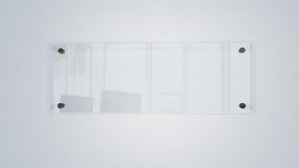Close-up of blank glass nameplate mounted on clean white wall, copy space