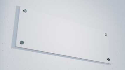 Low angle close-up view of blank rectangle nameplate mounted on clean white wall, copy space