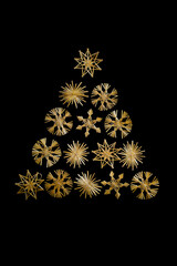 Christmas tree triangle made with straw snowflakes isolated