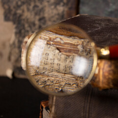 old books. examination with a magnifying glass. binding volumes