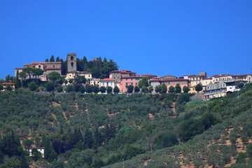 Fototapeta na wymiar View of Montecatint Alto on a Sunny Summer Day. Tuscanny, Italy.