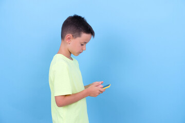 child with a smartphone in his hands. technology for children