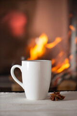 Warm tea by the fireplace.