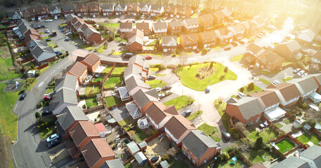 Aerial drone sunrise view of suburban houses in Edinburgh, Scotland, UK