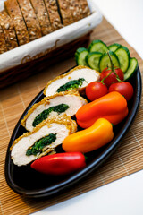 chicken roll spinach salad bread slice meal