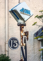 An old petrol pump in Ravenglass, Cumbria, UK.