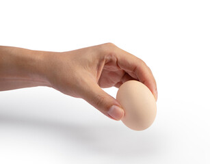 Hand holding a egg isolated on white background