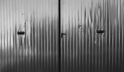 metal door, silver gray shiny retro garage, or warehouse door