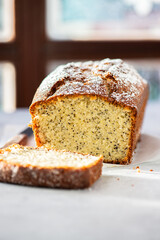 Slices of lemon pound cake with poppy seeds. Close up.