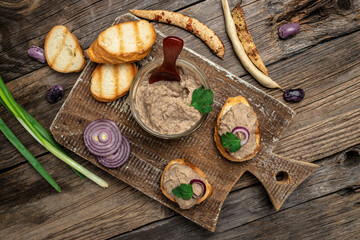 Toasts bread with beans paste, Mexican cuisine pate of beans in glass jar. healthy vegetarian food, top view
