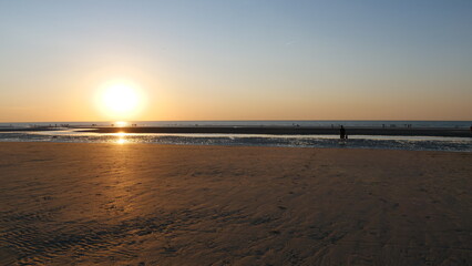 Fototapeta premium Sunset at the Beach, De Panne