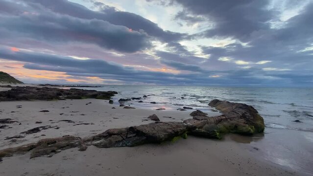 Sunset on the beach under the Covesea Skerries Lighthouse, Lossiemouth,Scotland.It is originally belonging to the Northern Lighthouse Board, is built on top of a small headland on the south coast 