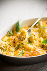 baked cauliflower with vegetables and cheese and scrambled eggs