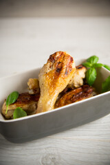 grilled chicken legs fried with spices and herbs