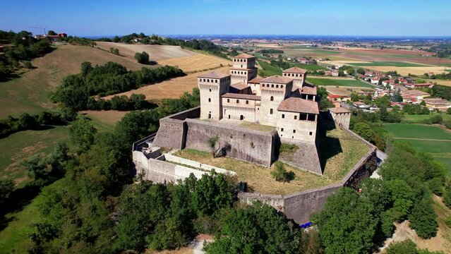 Torrechiara 4k drone footage of medieval castle and scenic vineyards in Emilia-Romagna Italy. Authentic winemaking region and fortress near Parma. Wine tourism destination landscape