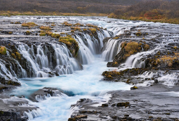 Blue water of Bruarfoss Waterfalls, Iceland