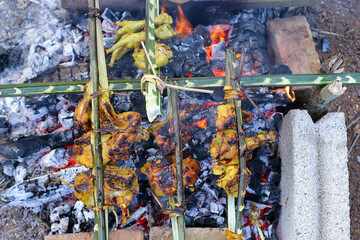 Indonesian traditional grilled chicken. grilled chicken that is grilled in the traditional Indonesian way.