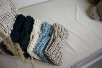 Fototapeta na wymiar Headbands crocheted knitted in the interior, product listing for sale