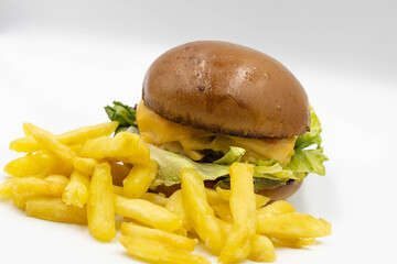 Burger and fried potatoes isolated on white background