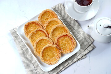 Pie Susu or custard tarts is popular snack from Bali, Indonesia.on white background 