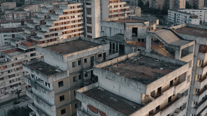 Abandoned and degraded building. Decaying housing complex in ghetto, city slums in a criminal and depressed area