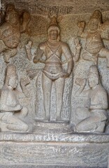 Bas relief rock cut sculptures of gods, people and animals are carved prominently in the monolithic cave temples at Mahabalipuram, Tamil nadu, India