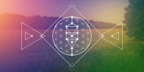 Flower of life sacred geometry spiritual new age futuristic illustration with interlocking circles, triangles and glowing particles in front of blurry natural photographic background