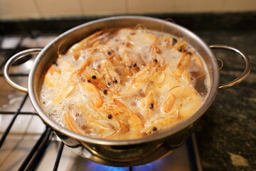 boiling shrimps at the kitchen