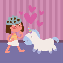 girl playing with unicorn