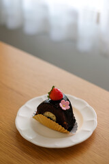 Chocolate cake with strawberry and cream cheese. Homemade bekery concept.