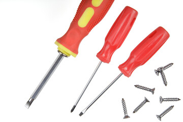 Flat Lay of close up of screwdrivers and screws