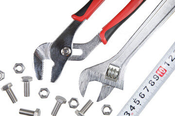 Flat Lay of a close up of tools used to tighten nuts and bolts isolated on a white background