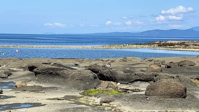 Low tides in the Pacific Ocean on Vancouver Island in Canada are visible to my fellow countrymen and somewhere on the pier there is a ship that may soon capsize because the water is leaving.