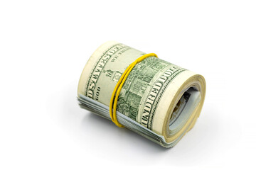 Bundle of money roll of dollars isolated on white background, stack of one hundred dollars American cash money bills rolled up with rubber band