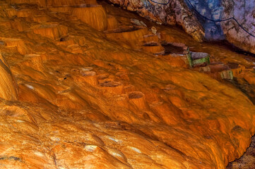 Beautiful internal water made cascades inside Stopica cave at Zlatibor, Serbia.