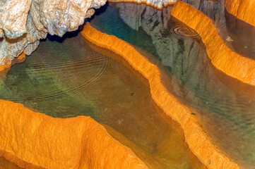 Beautiful internal water made cascades inside Stopica cave at Zlatibor, Serbia.