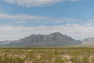 Scenic distant Organ Mountains vista under dramatic monsoonal sky, south east New Mexico
