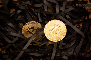 Bitcoin on a black background with reflection