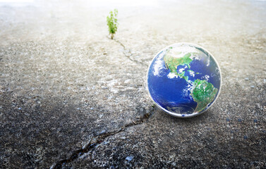 Earth World on Crack Concrete Floor, Choose the better way for our Sustainable Environment Natural World concept, Elements of this image furnished by NASA