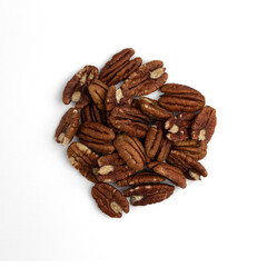 heap of pecan nuts isolated on white background