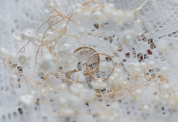 wedding rings on a pillow