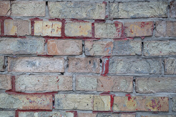 Masonry from old red bricks. Vintage background.