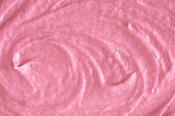 Pink cream texture. The surface of berry yogurt and a smoothie of whipped cream. Background texture...