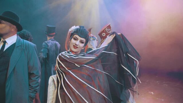 A performance by several theater artists on stage. Heroes of different operas. The main roles.