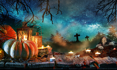 creepy halloween background, pumpkins with skeleton in graveyard at night on wooden board