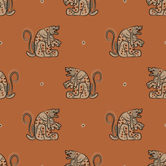 Seamless ethnic animal pattern with fantastic dogs. Native American art of Maya Indians. On orange background. © Olena