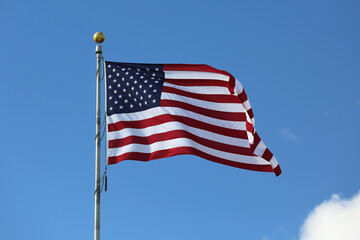 american flag waving in the wind