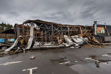Hostomel, Kyev region Ukraine - 09.04.2022: Outside the store, which was bombed, was looted by...